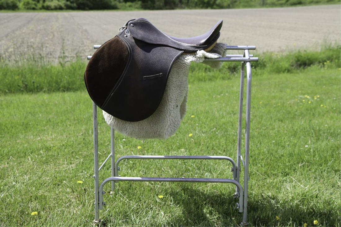 SILVER CUP ENGLISH LEATHER SADDLE & STAND: 17 inch saddle.