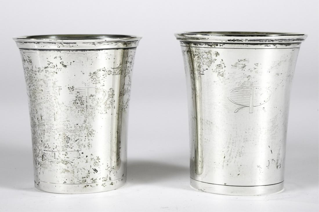 PAIR OF ROOSEVELT RACEWAY PRESENTATION JULEP CUPS: Sterling silver julep cup by Paul Doumeng. 4 1/2 inches. 8.21 troy ounces. Presented to William Haughton