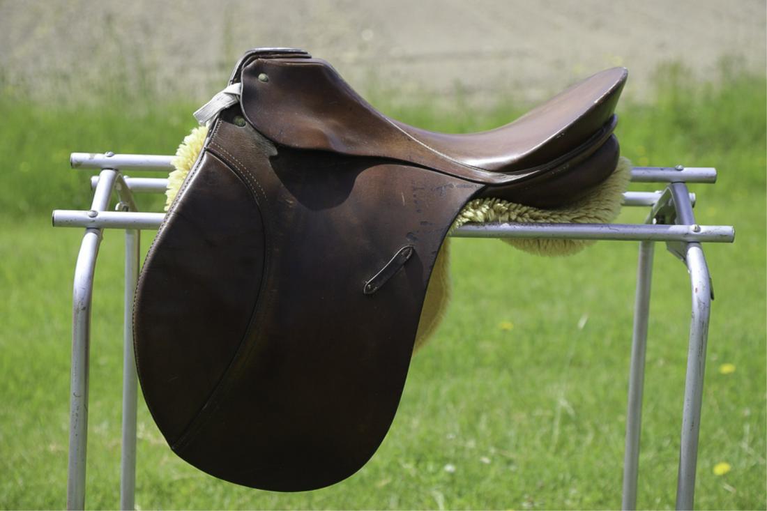G. PASSIER & SOHN ENGLISH LEATHER SADDLE: "Hanover" 15 1/2 inch saddle. Together with fleece saddle pad.