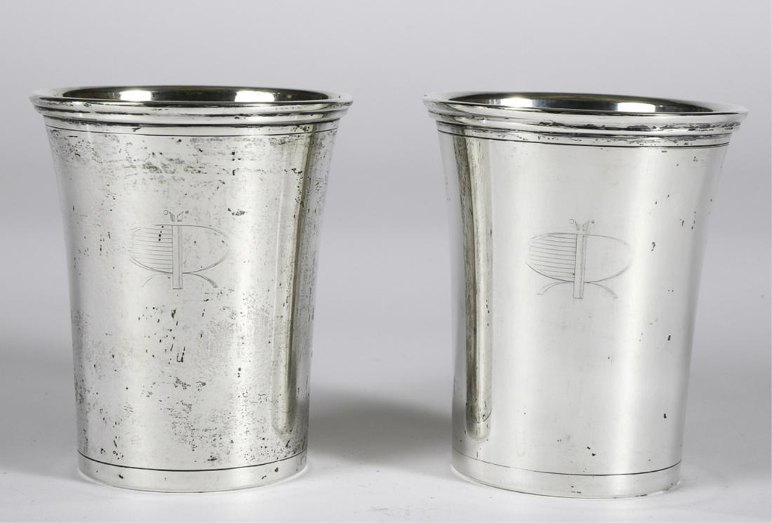 PAIR OF ROOSEVELT RACEWAY PRESENTATION JULEP CUPS: Sterling silver julep cup by Paul Doumeng. 4 1/2 inches. 8.21 troy ounces. Presented to William Haughton
