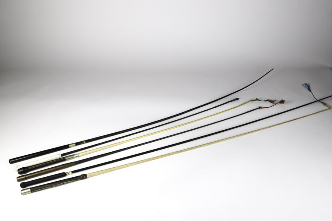 (6) VARIOUS HARNESS RACING DRIVING WHIPS: (1) Center Square Whips. 45 to 66 inches (approx each) with copper, leather, wood and rubber handles.
