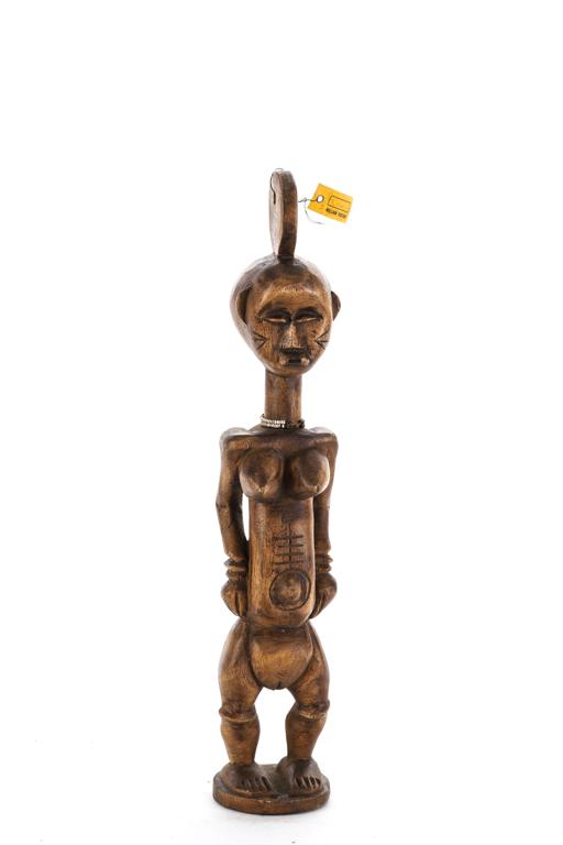 WEST AFRICAN FIGURE OF A STANDING FEMALE LATE 20th: Wearing a tall headdress, face, stomach and belly scarification. Glass bead necklace and bracelet. 20 1/2 inches.