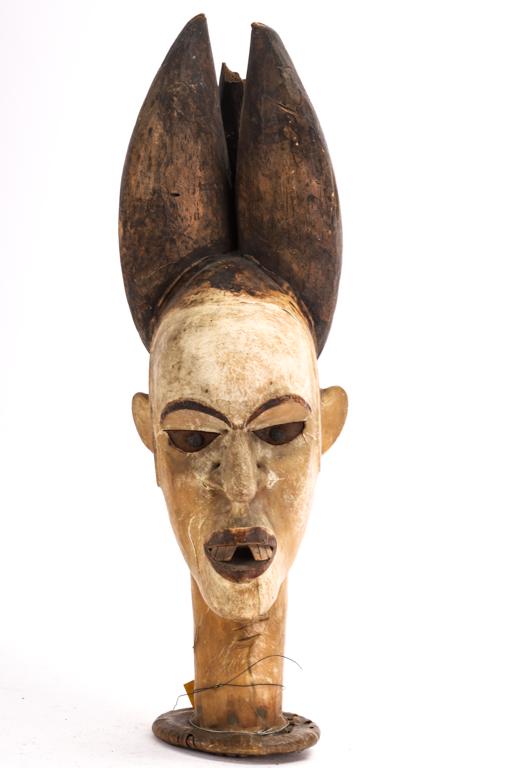 WEST AFRICAN BO nunamuin DANCING MASK HEADDRESS: c 1900. Carved and painted wood stretched with antelope skin. Protruding teeth, bronze and tin eyes. 16 inches