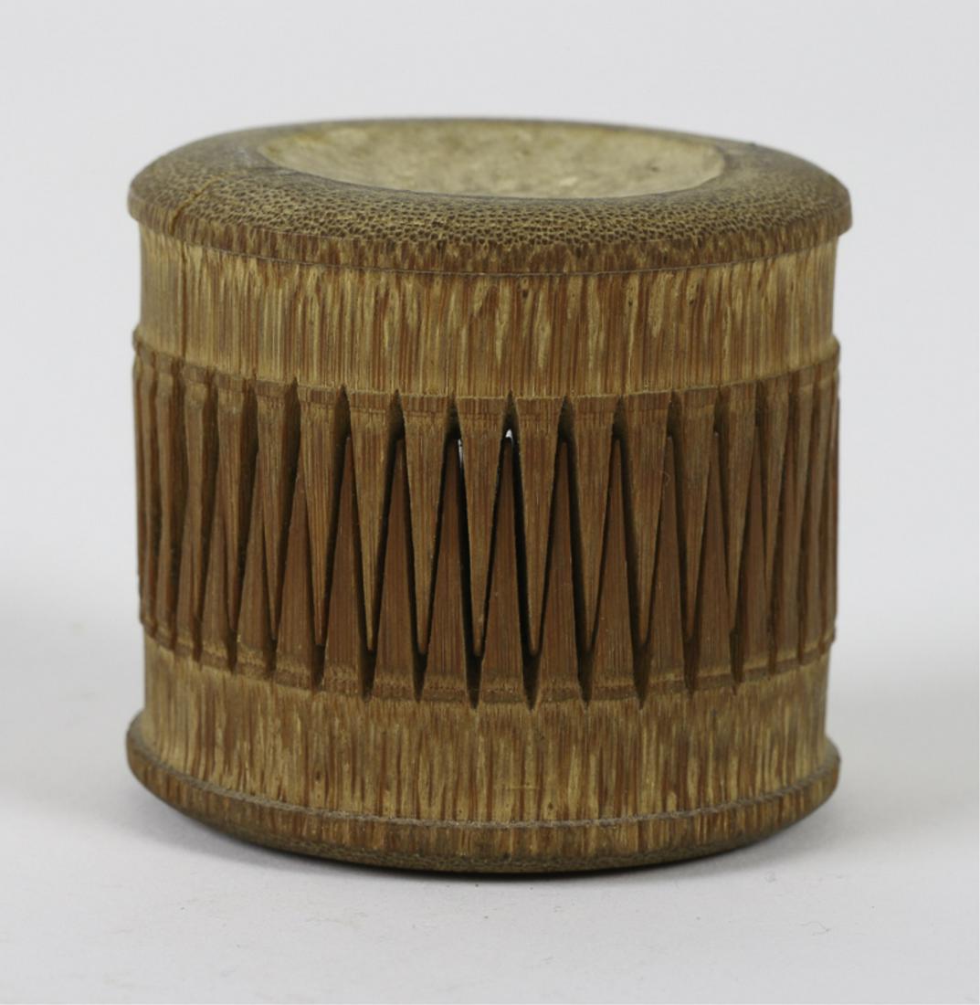 PAIR OF UNUSUAL AFRICAN COMBS: Carved wood. 1 1/8 x 2 inches