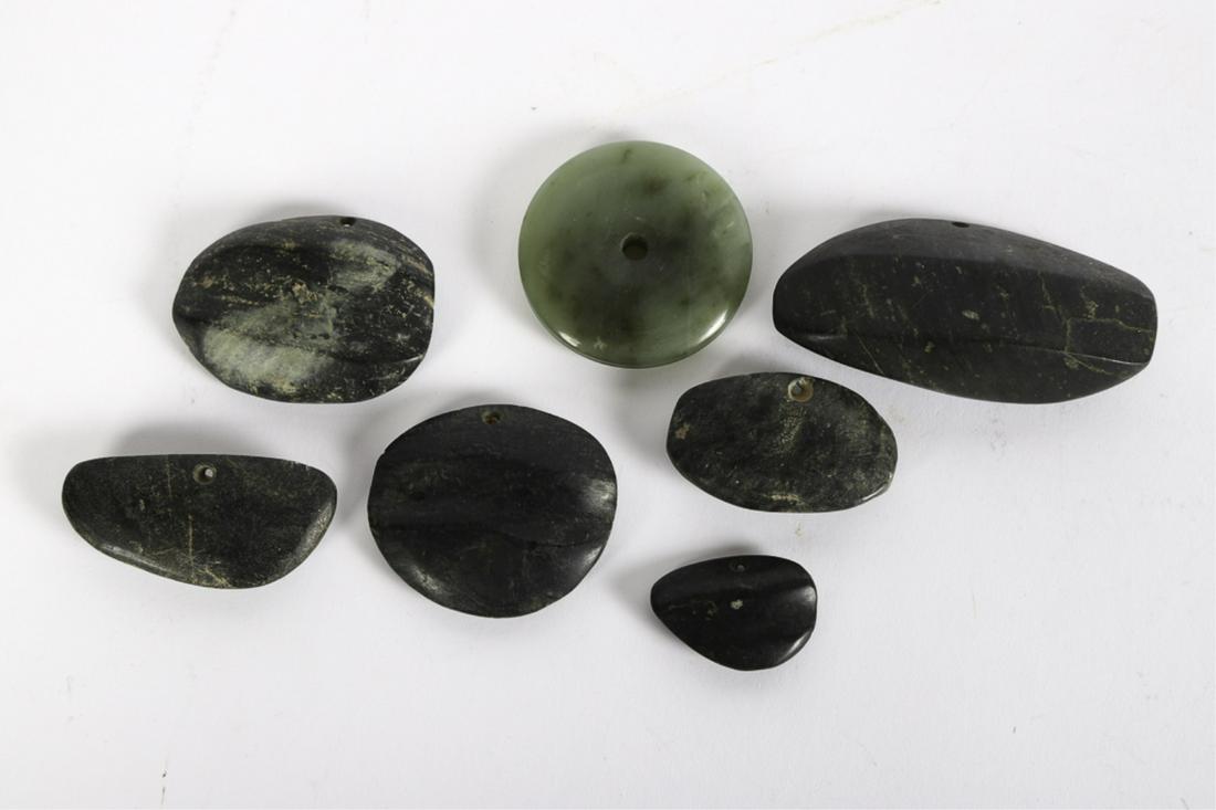 (7) PRE COLUMBIAN POLISHED AMULETIC HARDSTONES: (1) Possibly green jade. 3 1/2 inches (and under)