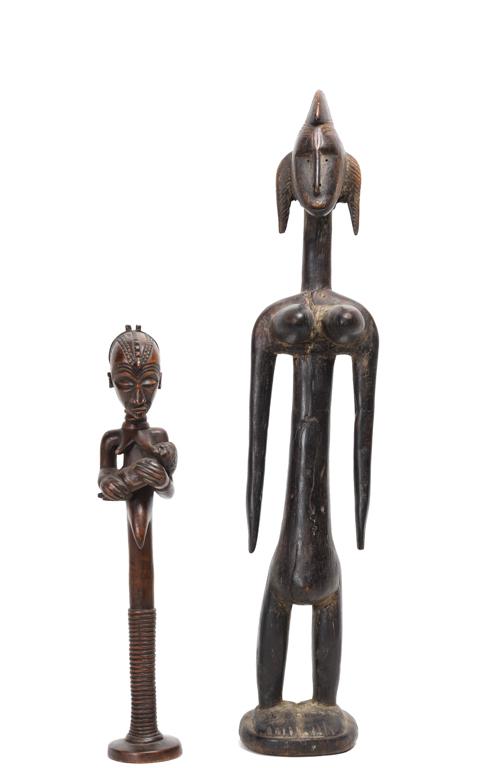 (2) BAMBARA / SENUFO & CENTRAL AFRICA FIGURES: (c. 1960s) (1) Elongated figure with prominent breasts and (1) elongated figure of mother holding a child with extensive scarification and brass neck rings. 25 1/2 and 16 1/2 inches