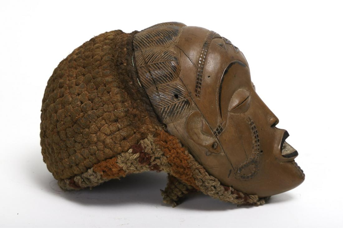 NIGERIAN FINELY CARVED MASK of a FEMALE FACE c1960: CHOKWE CONGO or ANGOLA. Well delineated hair and scarification. Cloth covering back. 10 inches.