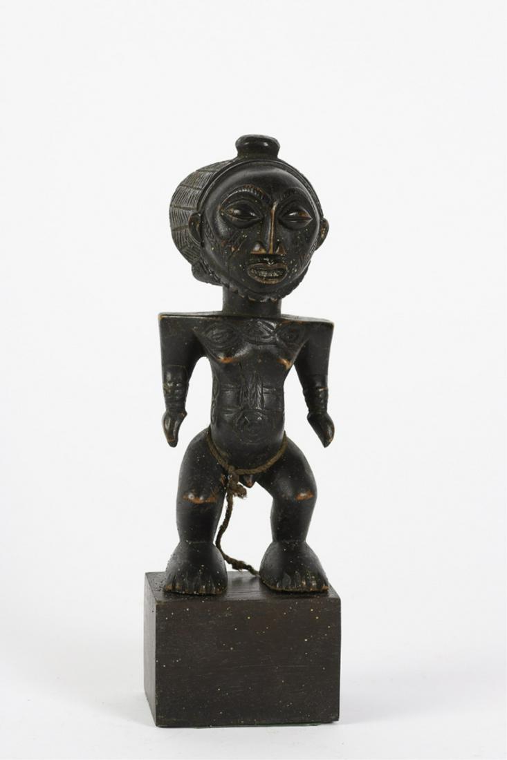 WELL CARVED SENUFO STANDING MALE ELDER FIGURE: (Early 20th c) Finely incised hair, beard and scarifications. 9 1/2 inches.