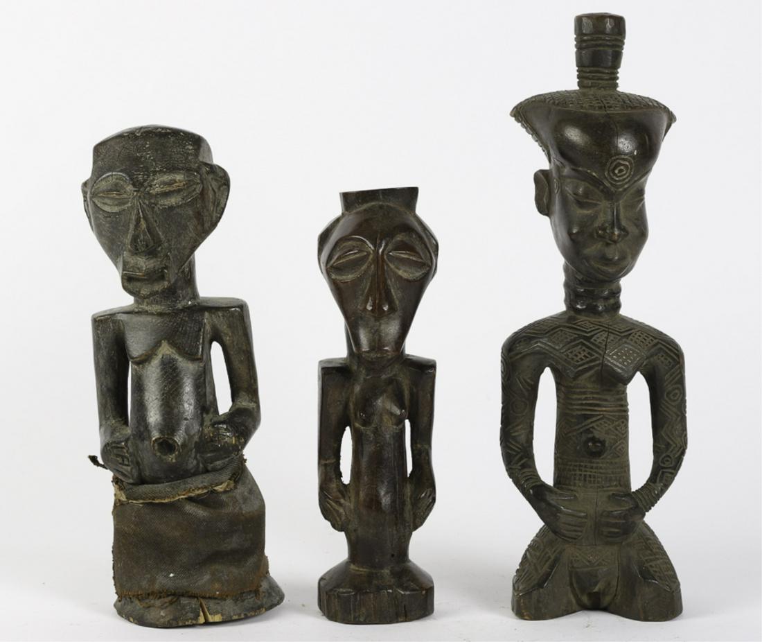 (3) CENTRAL AFRICAN CARVINGS OF WOMEN: (1) With extensive ornamentation and (1) with loin cloth made of a textile. 13 3/4 inches (and under)