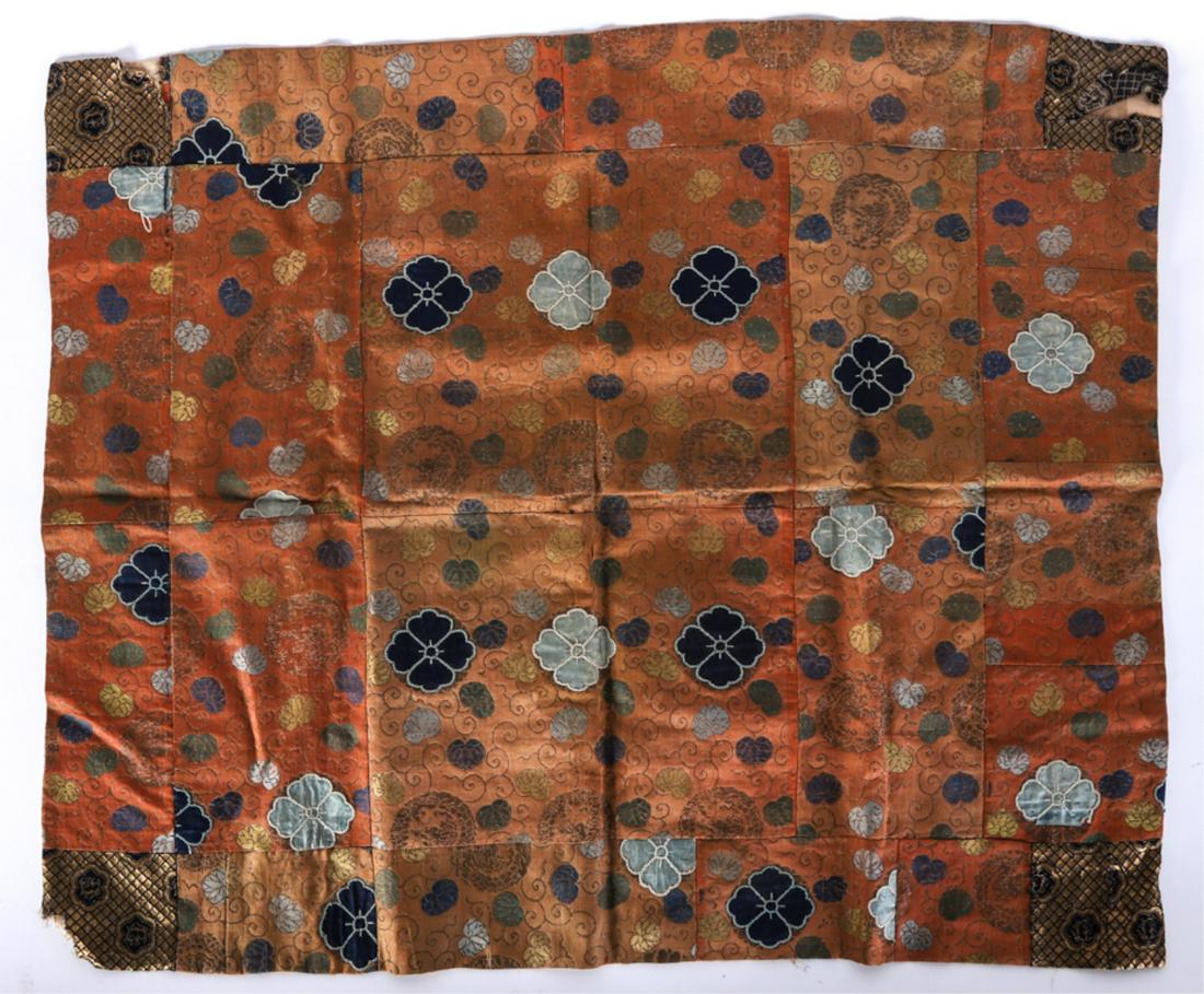(Early) CHINESE SILK EMBROIDERED TABLE SCARF: Embroidered with flowers and ginkgo leaves. The corners with metallic diaper patterns. 28 x 33 1/2 inches.