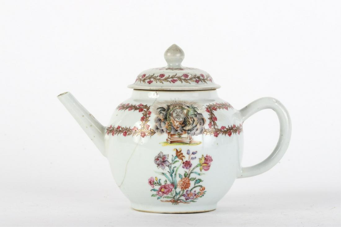 (18th c) CHINESE EXPORT ARMORIAL PORCELAIN TEAPOT: Hand painted with boughs of roses, flowers and heraldry on (2) sides. 6 inches.