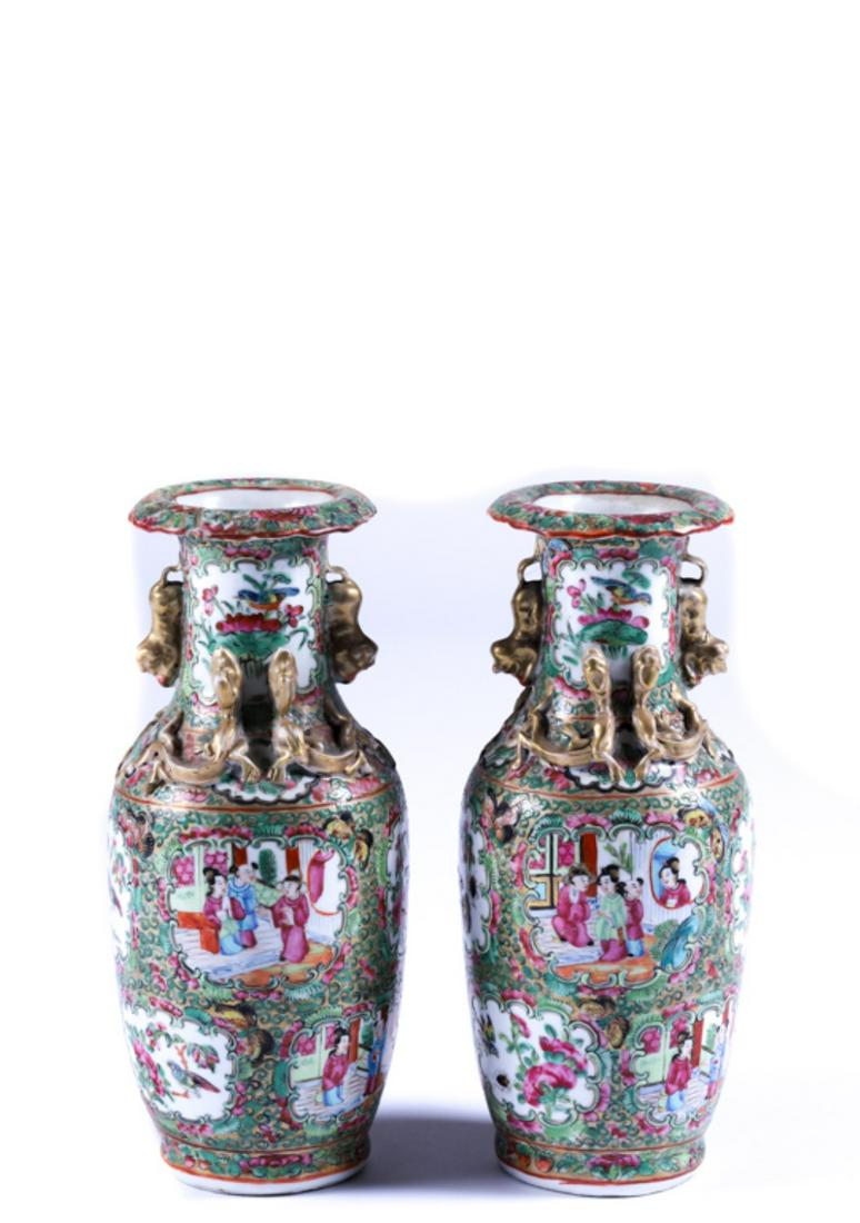 PAIR OF DIMINUTIVE CHINESE ROSE MEDALLION VASES: Nicely adorn with foo dog handles and chilong shoulders. unsigned. 9 inches.