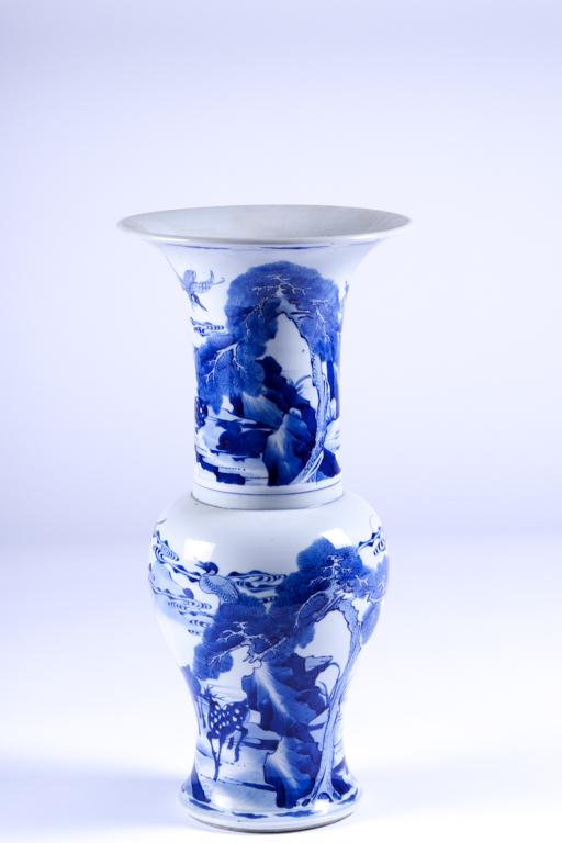 CHINESE BLUE & WHITE PORCELAIN VASE: Hand painted with forests with deer and birds. 18 1/4 inches.