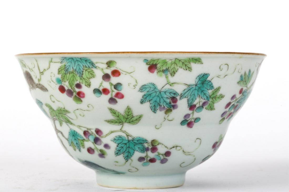 (19th c) CHINESE PORCELAIN BOWL: Decorated with squirrels under a canopy of plum berries. signed under foot. 3 1/2 x 5 3/4 inches.