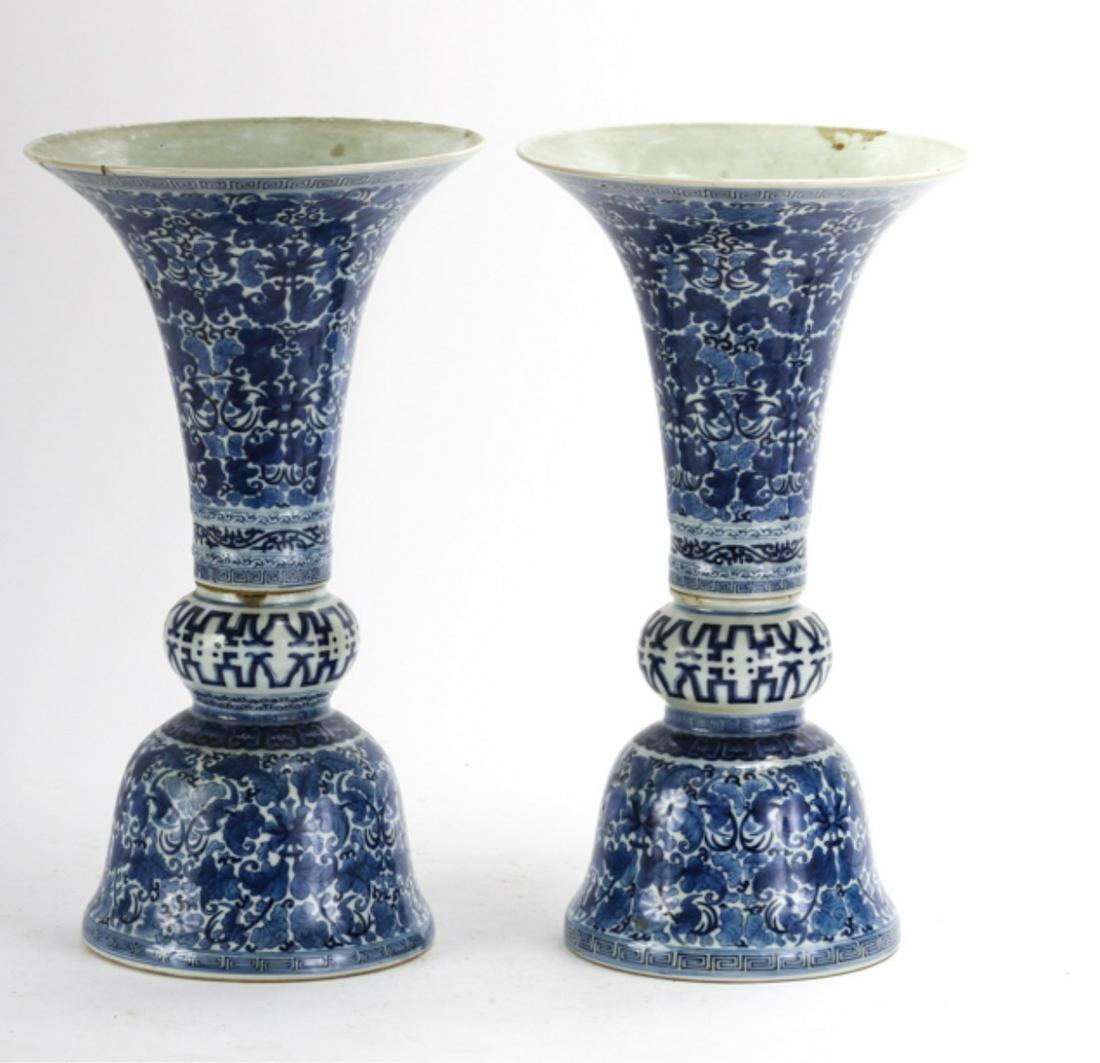 IMPRESSIVE PAIR of 19thc ASIAN PORCELAIN VASES: Produced in (2) parts with trumpet-form font over a bell and ball -form foot. unsigned. 16 1/2 x 9 1/4 inches.