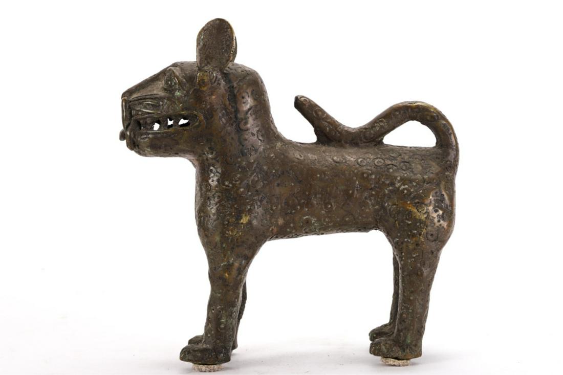 AFRICAN BRONZE BENIN SCULPTURE of GUARDIAN LEOPARD: 12 x 12 x 4 inches. unmarked. Note: For the Benin people, the leopard is a mighty and powerful royal animal, which rules the savanna as the king rules over his people. It also serves as a symbol of ju