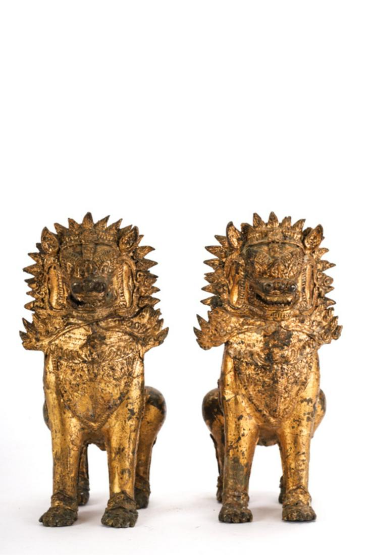 ANTIQUE PAIR of GILT BRONZE THAI FOO DOGS: 11 x 5 x 6 inches.