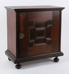 Pilgrim Century Joined Oak Spice Cabinet: Pine and maple spice chest with paneled door of geometric design, several drawers behind door, original butterfly hinges, fine natural color. Massachusetts 1670-1700. 21 x 20 x 11 ½ inches