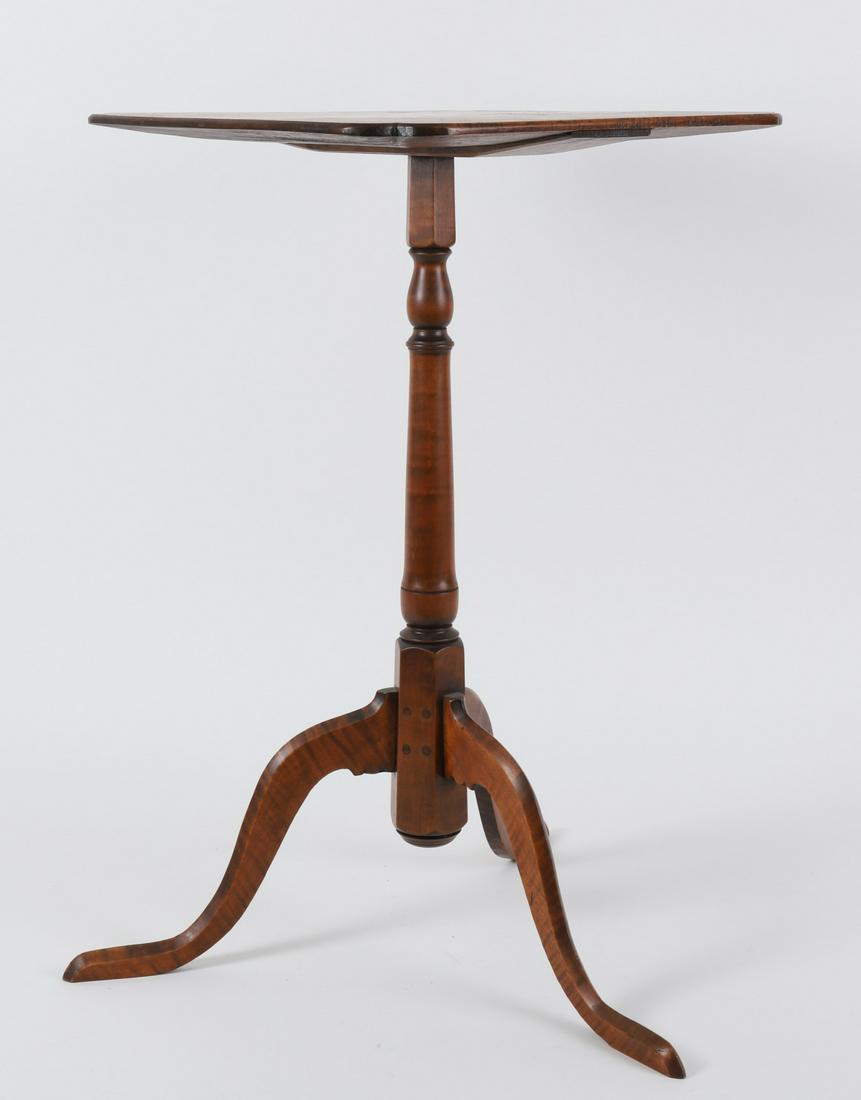 Eldred Wheeler Labeled Candle Stand: Square top with shaped corners, hexagonal and turned pedestal and tall delicate legs. 25 ½ x 16 x 16 inches