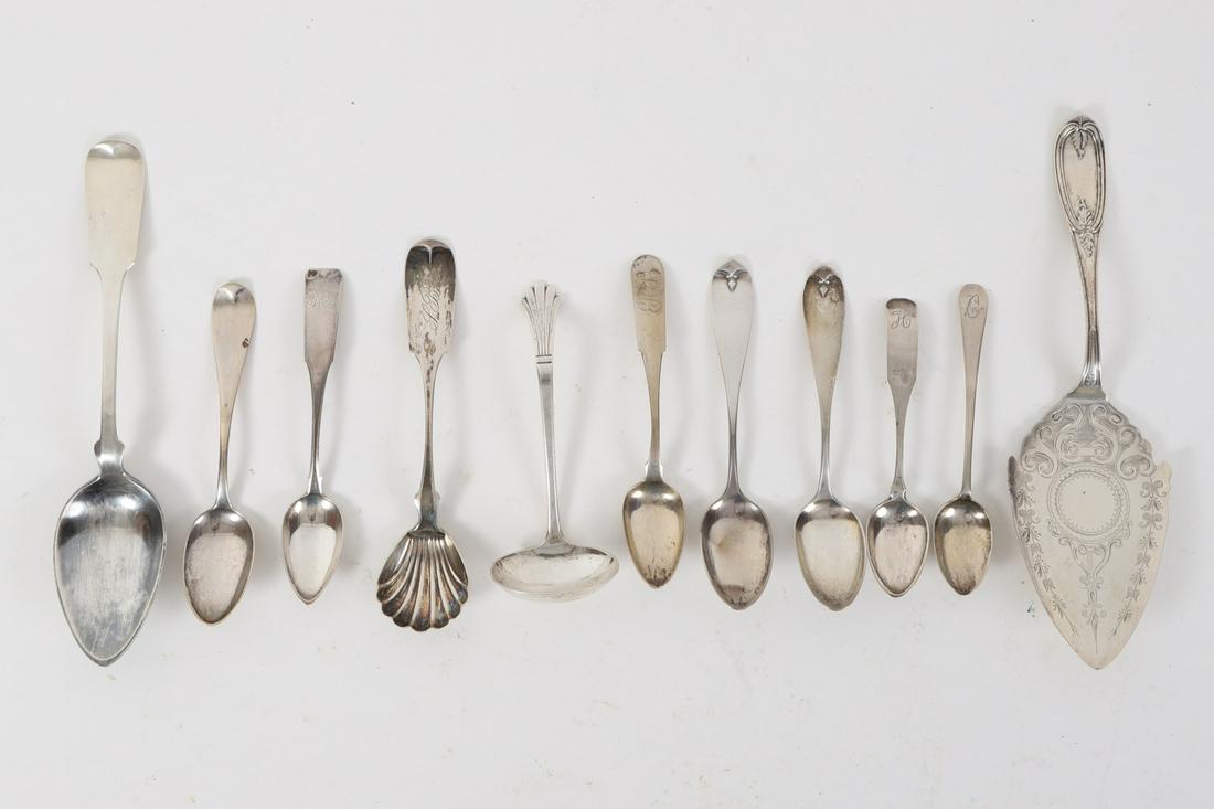 Grouping of Sterling Silver & Coin Flatware: (11) Pieces including: Pie Server, sugar spoons, tablespoon, sauce ladle and teaspoons 9 ½ inches (and under) 9.75 troy ounces