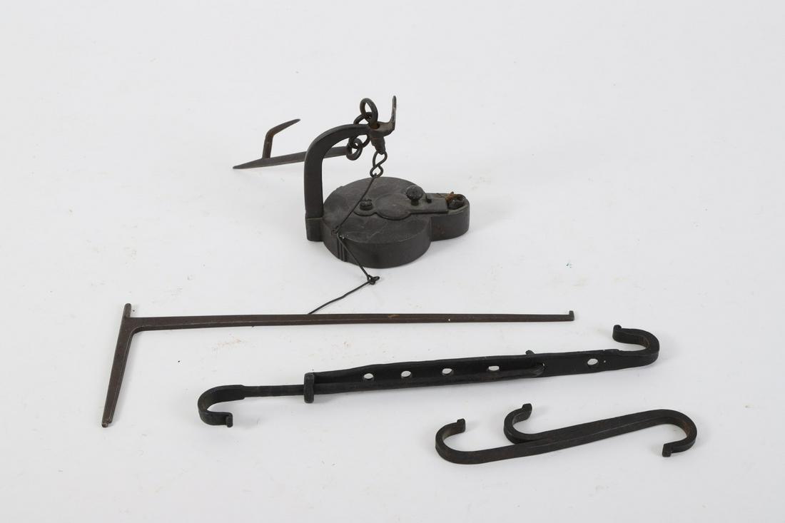 Betty Lamp, Miniature Trammel and Hooks: Finely wrought with sliding font cover, bird finial and looped to a pick-wick and sticking Tommy with chair rail hanger. Together with double S hook, trammel and crane. 11 inches (and under)