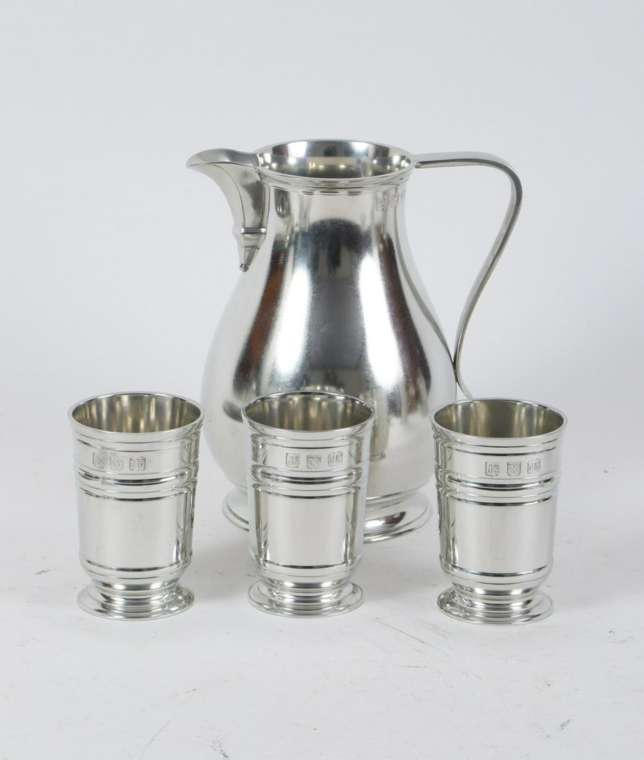 Collection of Fine Quality John Somers Pewter: (13) Pieces including: Beer jug, Water pitcher, William and Mary beaker, William and Mary tankard, (2) pint and (2) half pint mugs, (3) footed cups, porringer, candlestick, plate and (1) bread plate a