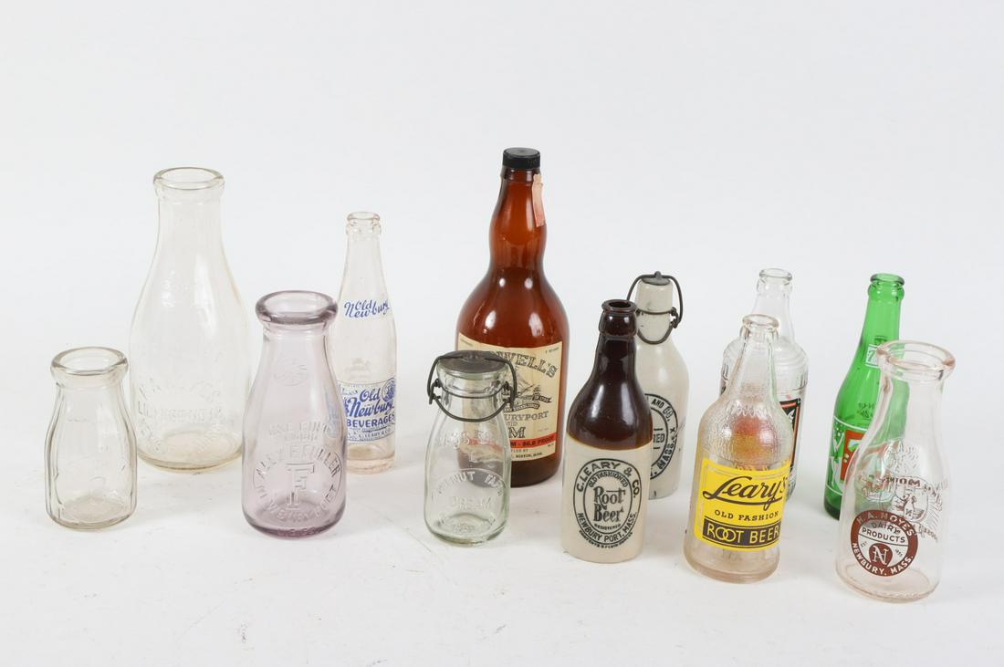 Grouping of (12) Newburyport Bottles: Including: Leary's, Caldwells, Noyes, Glynn, Chase, and Fuller. Some harder to find examples. 11 inches (and under)
