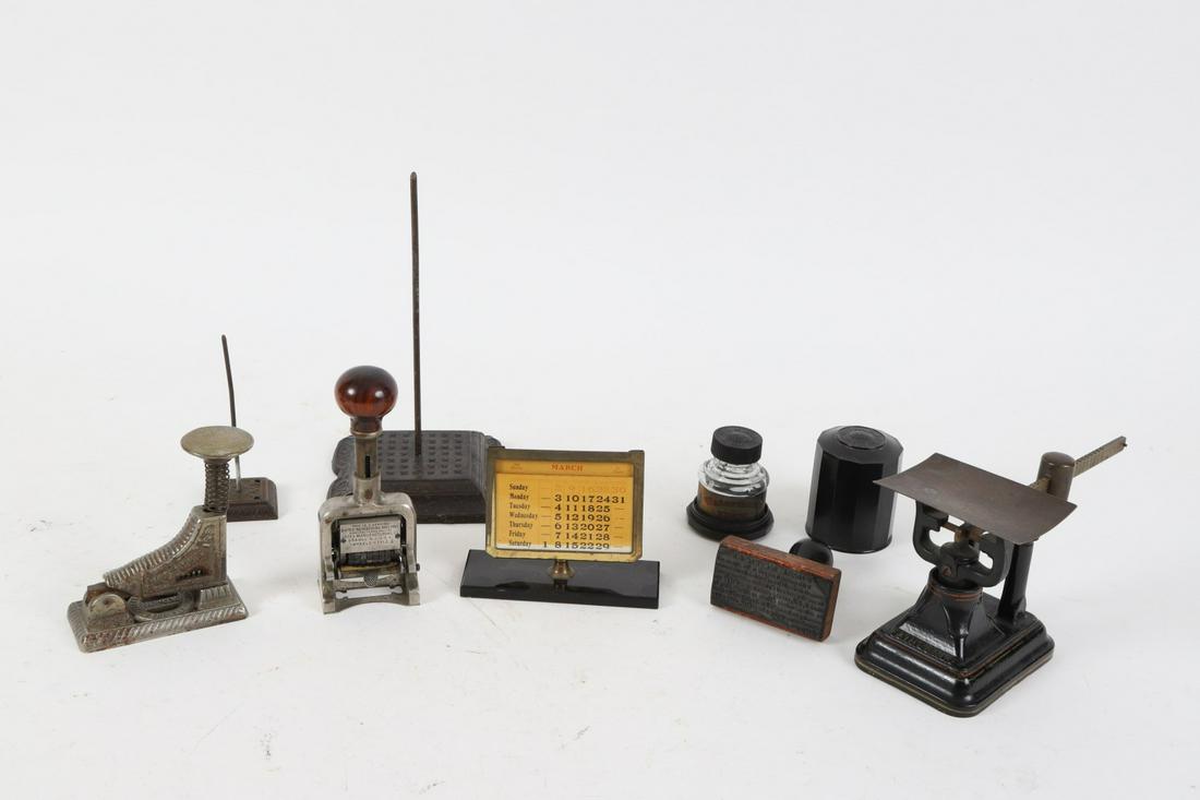 Grouping of (8) Office Accessories: Including: Hotchkiss Stapler, Bates numbered, Fairbanks balance scale, Waterman's Ink Bottle in its original Bakelite canister, calendar, final notice stamp and (2) receipt spikes. 9 ½ inches (and un