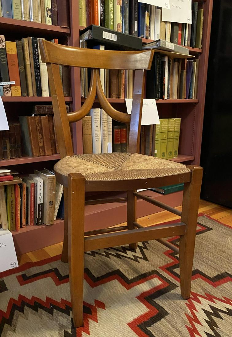 BIEDERMEIER INFLUENCED SIDE CHAIR: Fine hard wood cherry ? with shaped and scrolled back, rush seat and off-set legs. 24 x 18 x 18 inches