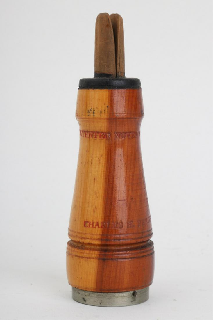 CHARLES H. PERDEW WOODEN DUCK CALL: Stamped "Charles H. Perdew, Henry, ILL." The other reads, "Patented November 2, 1909". 5 1/2 inches