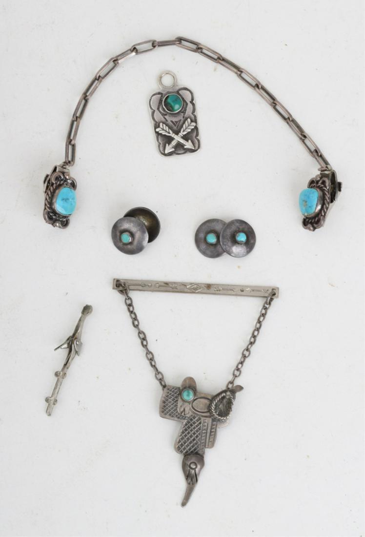 NAVAJO SILVER MEN'S JEWELRY ACCESSORIES: Including: Vest chain, tie clasp, arrow fob and a pair of cuff links each set with polished turquoise. Vest chain is 8 inches. 1.15 troy ounces