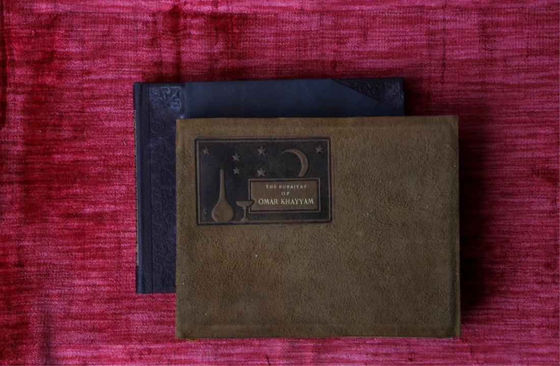 2) EXAMPLES RUBAIYAT OF OMAR KHAYYAM ROYCROFT SHOP: (1) East Aurora, NY. Elbert Hubbard 1899 signed No. 425/920. 6 x 8 inches. soft cover suede bound. (1) Roycrofters. 1922. hardcover 3/4 leather bound. 6 1/2 x 8 inches. Presented in its original dust