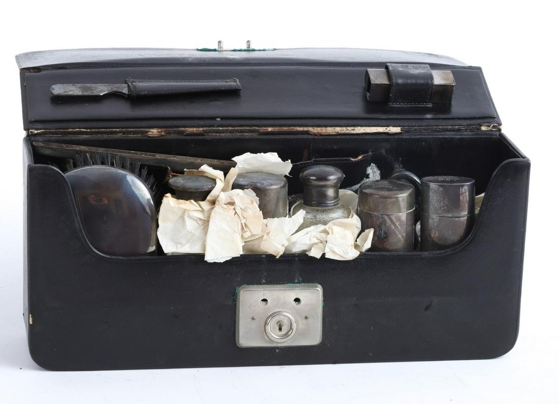 FITTED TRAVELING TOILETRY CASE w/ STERLING PIECES: Each element marked sterling except scissors and buffer. 5 x 12 x 2 1/2 inches