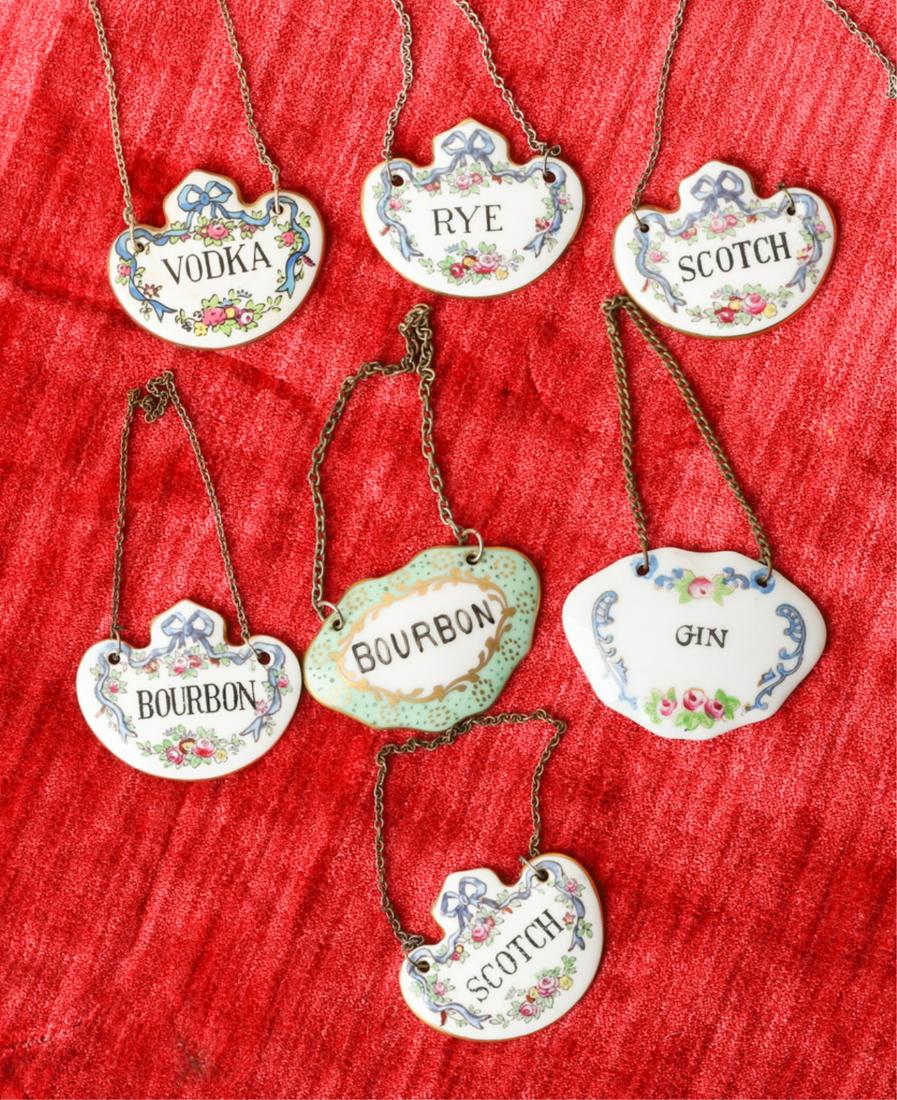 MATCHING SET OF (5) STAFFORDSHIRE LIQUOR TAGS: Bourbon, Vodka, Rye, Scotch and Scotch. 1 3/4 x 2 inches (not including chain) and an unmarked Gin and Bourbon made in France.