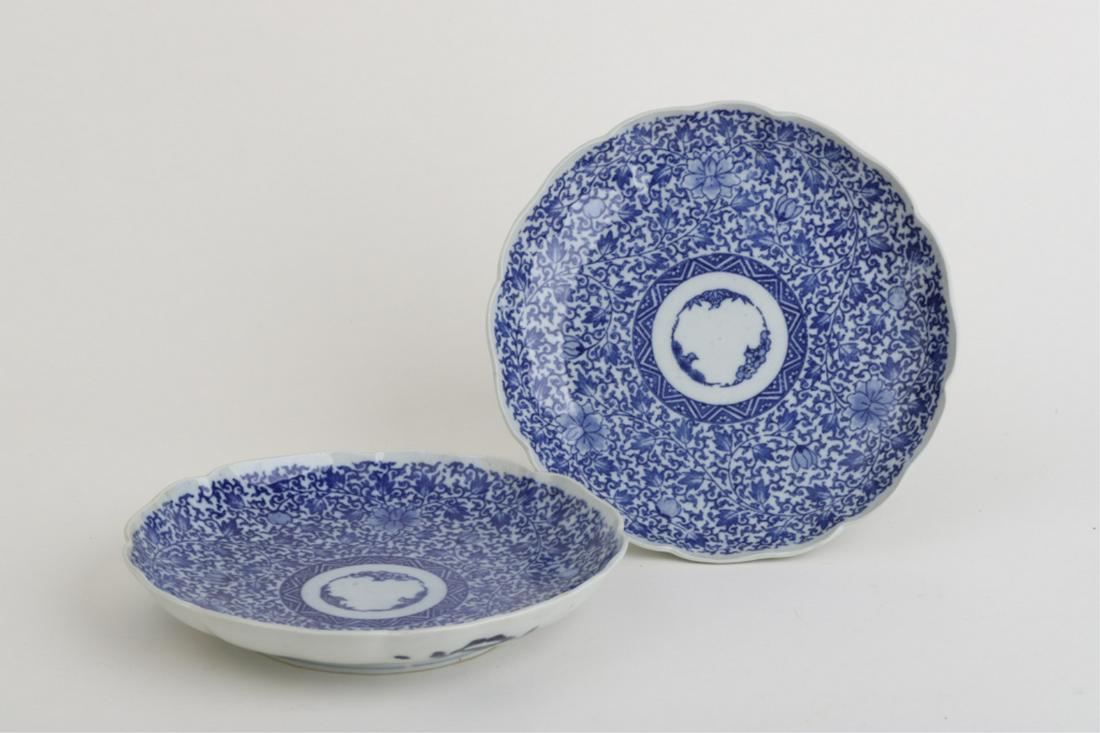 PAIR OF CHINESE BLUE & WHITE PORCELAIN PLATES: Rich cobalt outer bowl and elaborate floral diaper pattern in the well. unsigned. 8 3/4 inches.