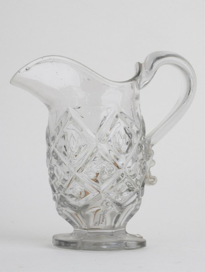 (5) EAPG CREAMERS attributed to SANDWICH: Including: Palmette with applied handle, Jacob's Ladder, Diamond Thumbprint with applied handle, Horn of Plenty with applied handle and a helmet form with applied handle. 6 3/4 inches (and under)