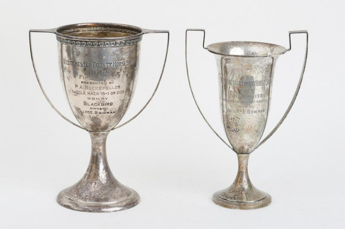 (2) STERLING SILVER HORSE SHOW TROPHIES: 1922 Presented by P. A. Rockeffer won by Blackbird and owned by J. McE. Bowman Black Starr & Frost makers. 8 3/4 inches. 1924 won by J. McE. Bowman. 9 inches. 20.69 troy ounces