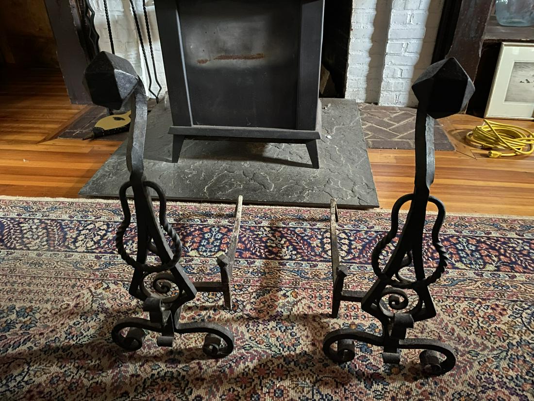 HAND WROUGHT ARTS AND CRAFTS ANDIRON SET c1910: (5) Piece set heavily faceted set includes a pair of 31 inch andirons with horizontal tie, 37 inch tongs and 36 inch shovel and bellows and shovel from another set
