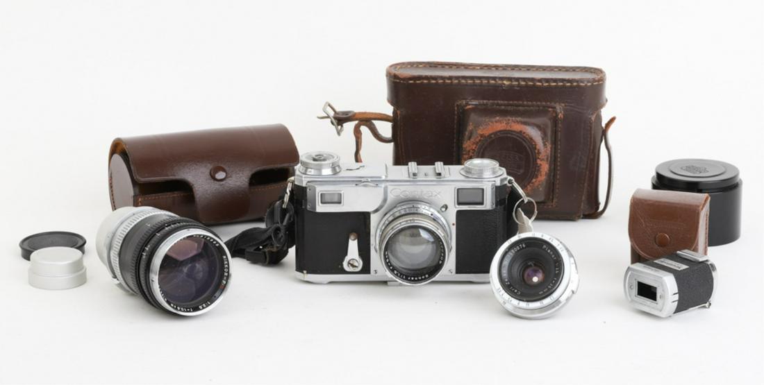CONTAX II A RANGEFINDER with CARL ZEISS JENNA LENS: Together with a viewfinder attachment, Carl Zeiss Planr 35 mm lens, 50mm Sonnar and a Nippon Nikkor 1:2.5 f 10.5 cm lens. Together with an Ising tripod