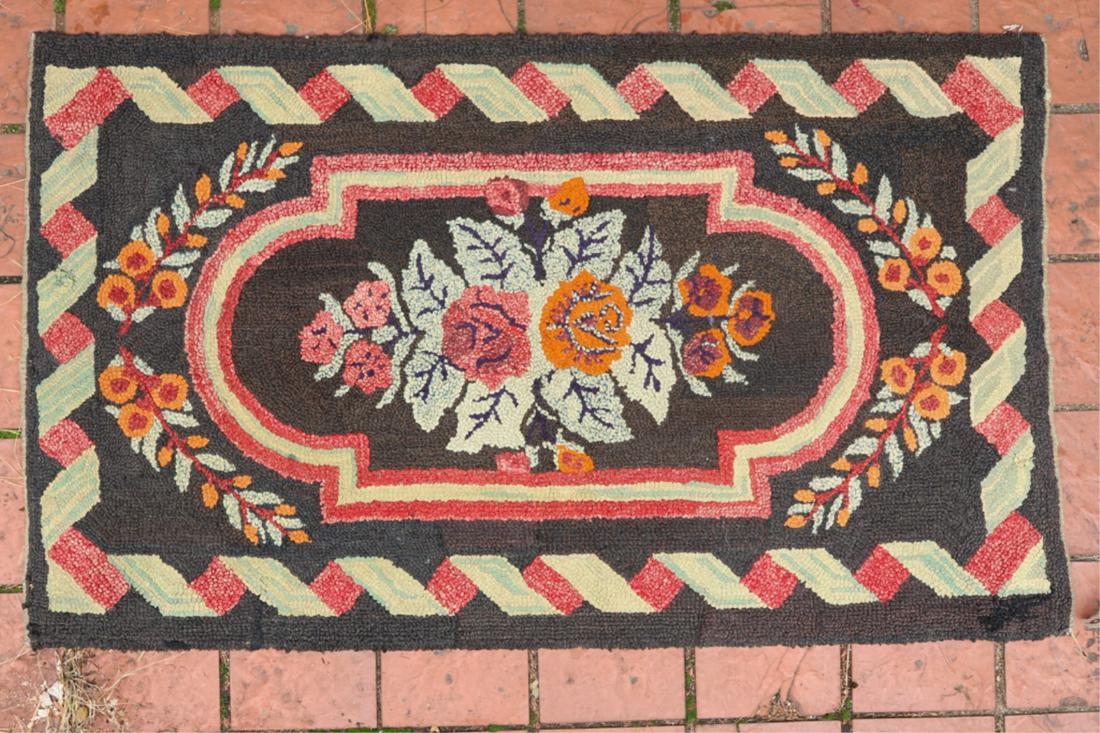 HOOKED RUG with ROSES within CARTOUCHE & BORDER: 32 x 54 inches