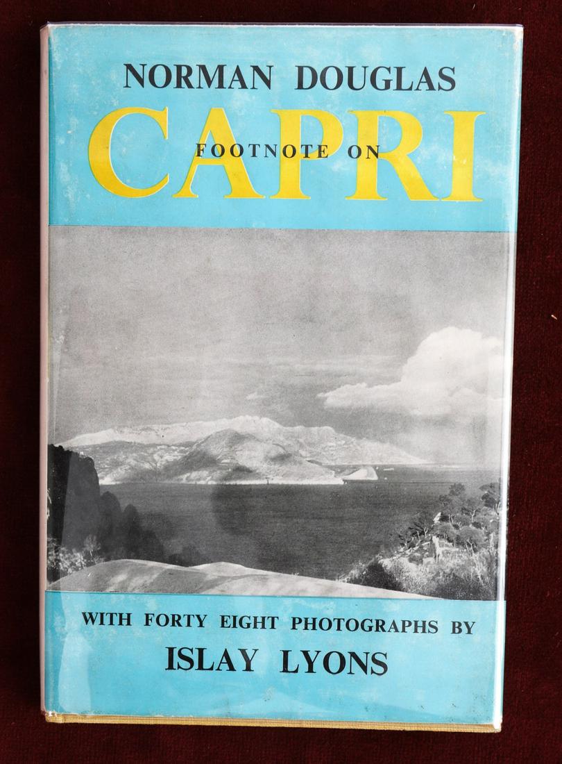 NORMAN DOUGLAS "FOOTNOTE ON CAPRI" 1952: Photographs by Islay Lyons. London. Sidgwick and Jackson Ltd. 1952. Hardcover clothbound with its original dust jacket. 7 1/2 x 5 1/4 inches.