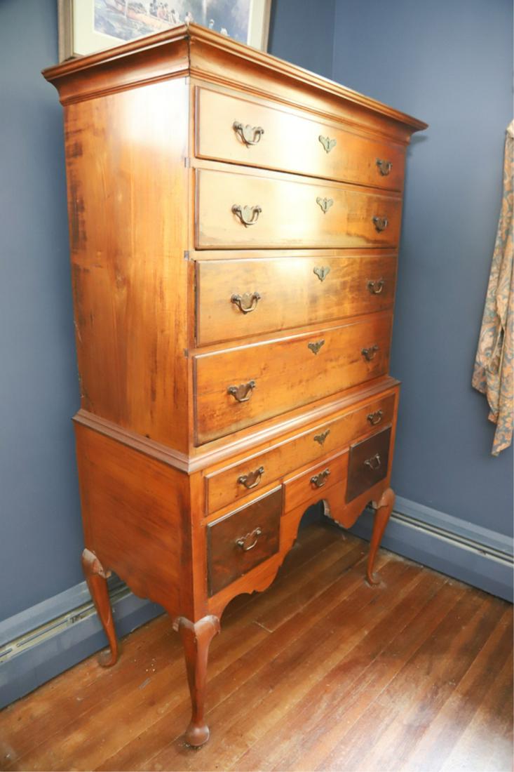 (18th c) QUEEN ANNE MAPLE HIGHBOY: Flat molded top over (4) graduating molded drawers. The bottom case with (5) molded drawers, aggressively shaped apron and cabriole legs with pad feet. 65 x 40 x 19 inches