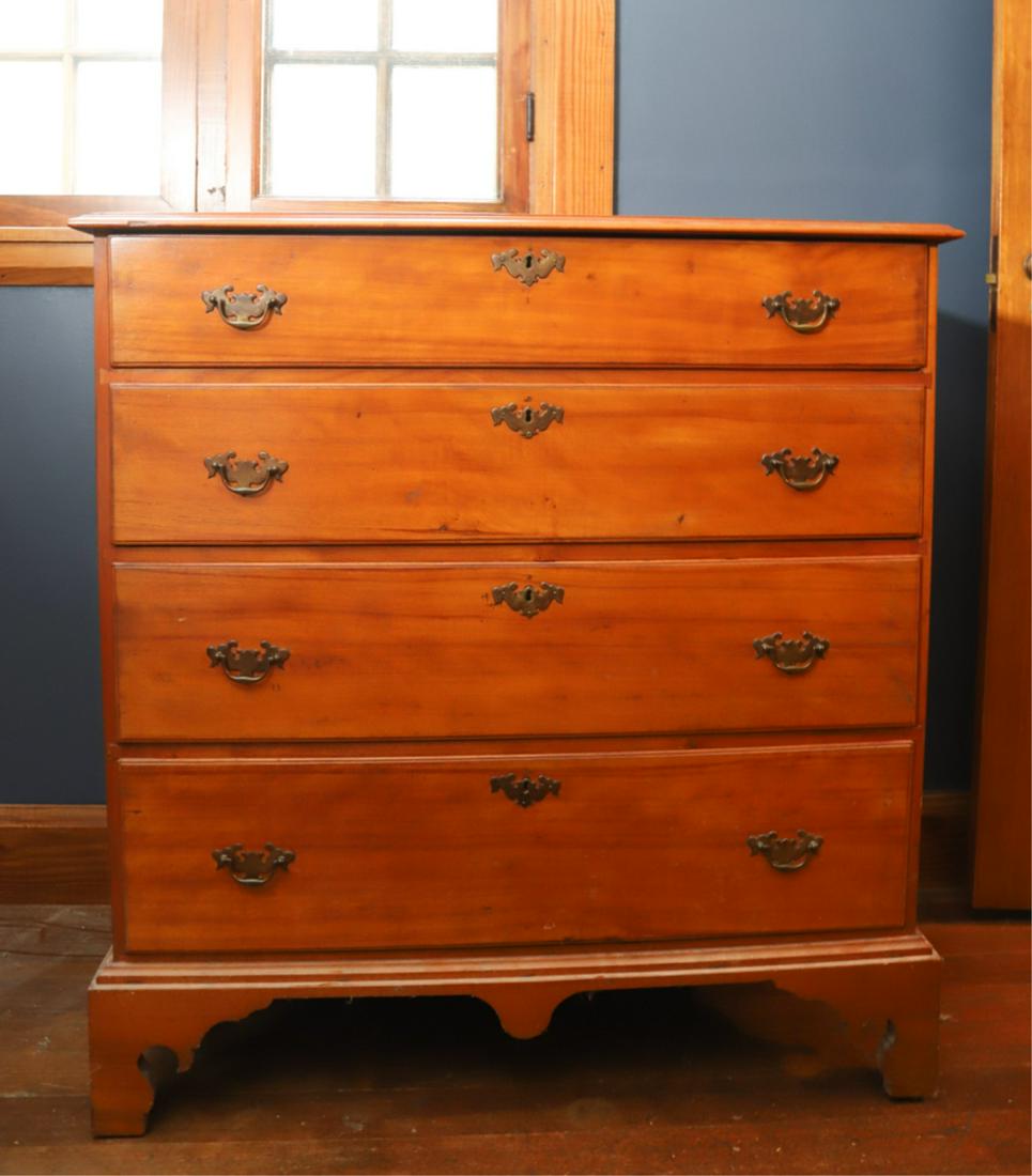 CHIPPENDALE MAPLE GRADUATING CHEST OF DRAWERS: Molded top, drawers and base with shaped center drop, bracket feet with shaped returns. 40 x 38 x 19 inches.