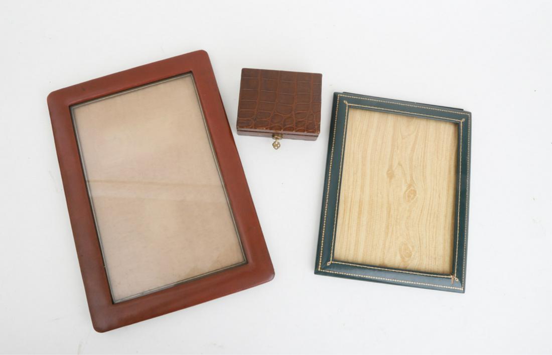 SMALL LEATHER JEWELRY BOX & (2) LEATHER FRAMES: Locking fitted jewelry box 1 1/2 x 4 1/2 x 3 1/2 inches together with (2) fine quality standing picture frames 14 x 10 and 10 x 8 inches