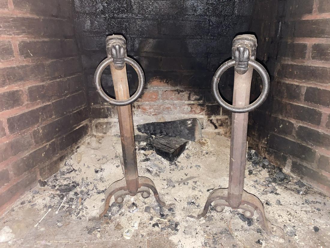CAST IRON LION ANDIRONS with RINGS: 21 inches (height)