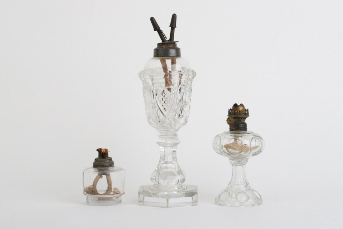 (19th c) FLINT GLASS WHALE OIL LAMP with HEARTS: Set with camphene burner. 11 inches (overall). Together with (2) additional glass lamps.