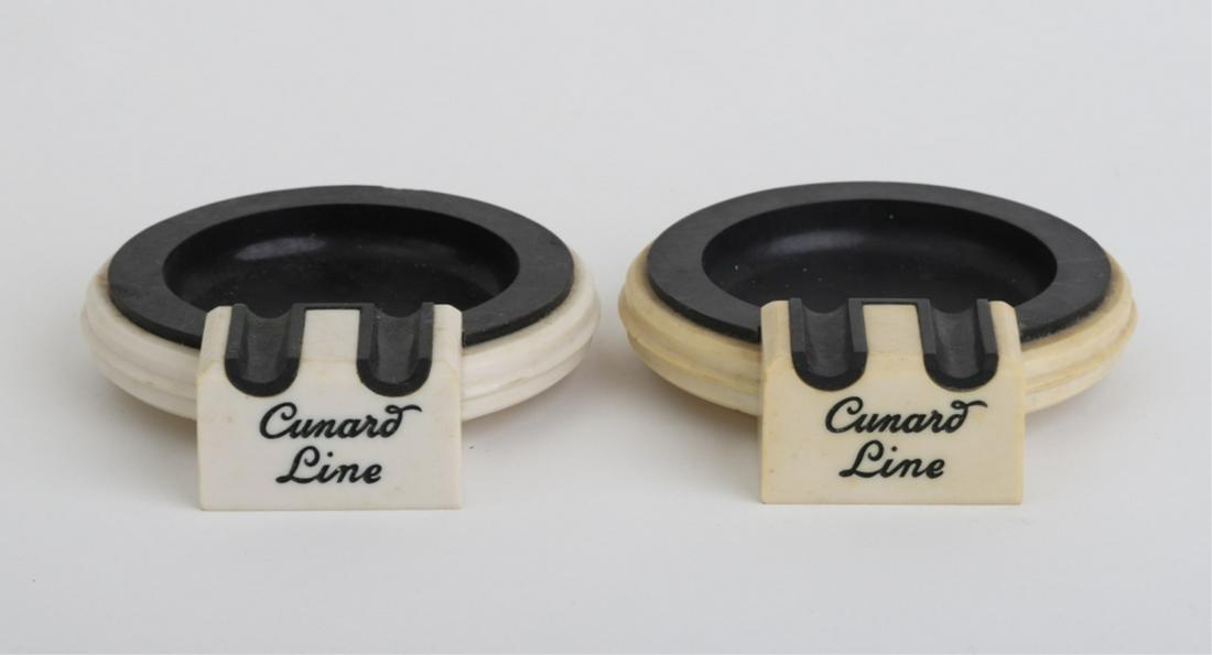 (2) CUNARD LINE BAKELITE ASHTRAYS: Manufactured by "Souvenir" 4 1/2 inches (widest diameter).