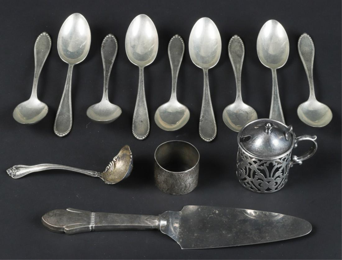 (9) GORHAM STERLING SILVER SPOONS & (4) OTHERS: Including: Towle sauce ladle, coin napkin ring, overlay for sugar marked 889 and a pie server. 9 3/4 inches (and under). 12.57 troy ounces (not including server with sterling handle)