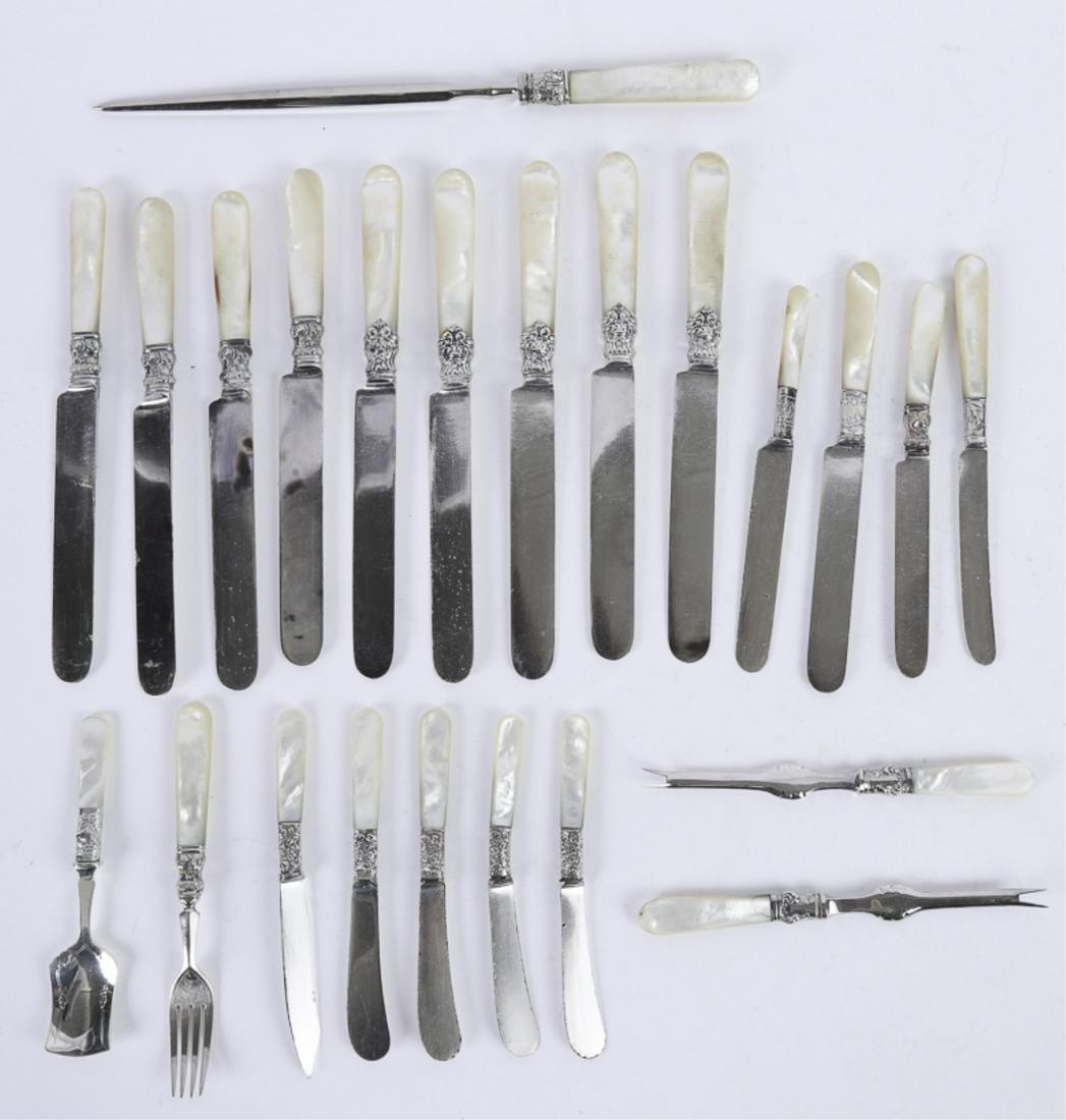 MOTHER OF PEARL FLATWARE: Including: Skewer, (2) lobster picks, (9) dinner knives, (1) luncheon knife, (1) pastry fork, (1) pastry knife, (4) butter knives, shovel and (3) dessert knives