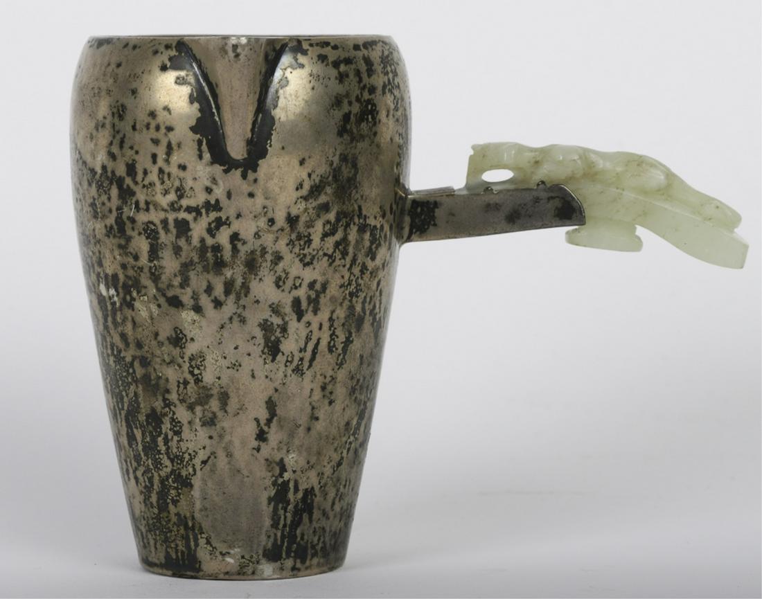 IMPORTANT MARIE ZIMMERMAN JADE & STERLING CREAMER: Hammered sterling creamer w/ 18th/19th c. Chinese white jade carved chilong belt hook handle. Stamped on bottom signed M. Zimmerman maker sterling w/ artist mark circa early 20th c. Marie Zimmerman 18